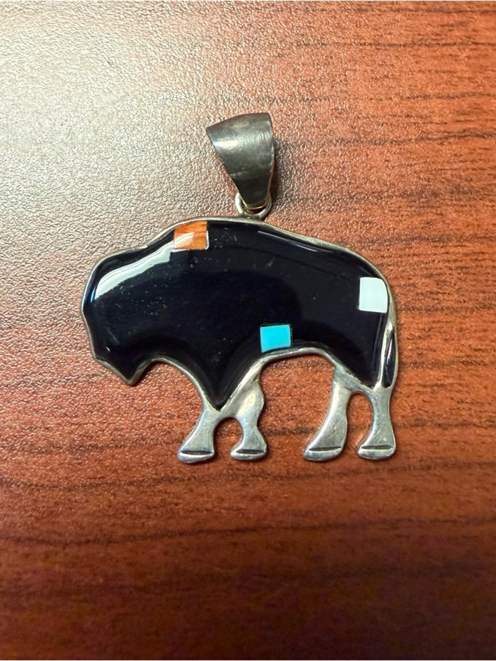 A Turquoise Network item-Black Buffalo Inlay w/Turquoise, Orange & White Accents